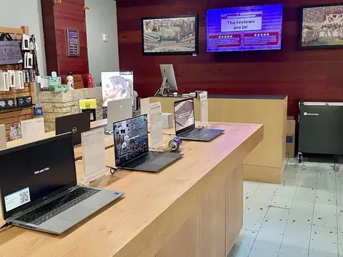 Laptops on display inside the 12th Man Technology MSC store