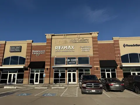 The Real Estate Gallery building on State Hwy 6 South, home of the 12th Man Technology Service Center