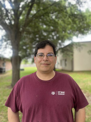 Photo of Richard with background out of focus.